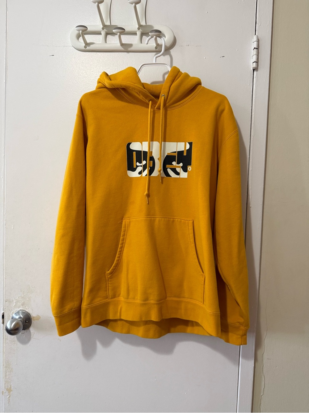 Obey Mustard Yellow Pullover Hoodie with Graphic Chest Logo